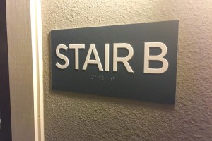 Aura Memorial Apartments Stairwell ID with ADA/Braille