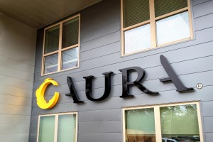 Aura Memorial Apartments Identity LED Halo Lit Letters by Leasing Office Day