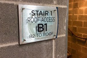 Echo Stairwell Egress Brushed Alum Backer with Clear Acrylic and Stand-Offs