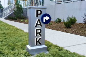 Echo City Apartments Illuminated Parking Directional Day