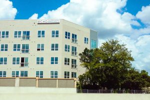 Echo City Apartments Illuminated Building Sign from Freeway