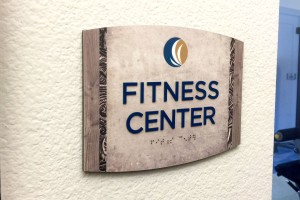 Grand Mason Aparmtnets Fitness Center ID with ADA/Braille