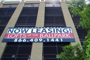 Lofts At The Ballpark Apartments Garage Framed Banner