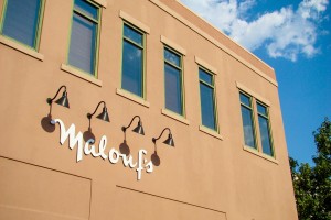 Malouf's Fine Men's and Women's Apparel Signage Back of Store