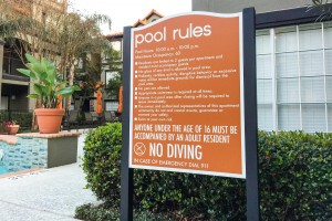 The Villas Mail Durable High-Pressure Laminate Pool Sign on Double-Post