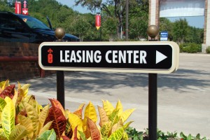 Elan at Bluffview Apartments Leasing Center Directional on Post