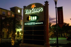 Elan at Bluffview Apartments at The Shops Illuminated Tenant Sign Night