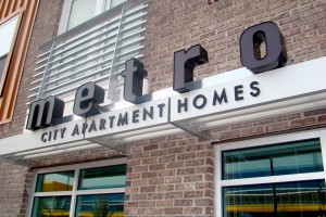 Metro City Apartment Homes Illuminated Letters on Aluminum Awning Day