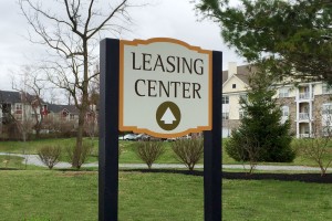 Treetops At Chester Hollow Apartment Homes Leasing Center Sign on Post