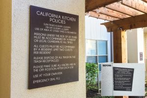 Boardwalk at Town Center Apartments - Exterior Rules Sign by Patio