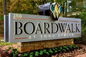Boardwalk at Town Center Apartments - Contemporary LED Edge-Lit Letters Monument onto Existing Masonry Base