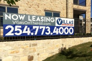 Villas on the Hill Apartments - Temporary Marketing Banner on Fence