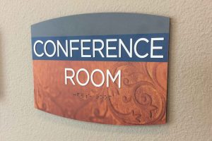 Villas on the Hill Apartments Interior Amenity ID with Tactile Letters and Braille