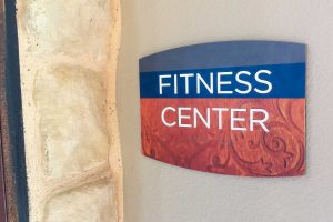 Villas on the Hill Apartments - Fitness Center ID with Tactile Letters and Braille