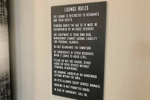 Main Street Lofts Lounge Rules with Tactile Letters