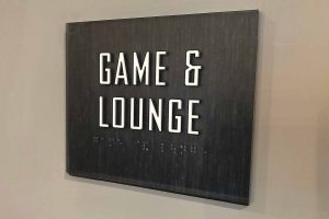 Main Street Lofts Game & Lounge ADA ID Sign