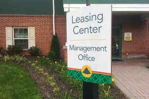 The Alden South Hills Apartments Management Office Directional Sign